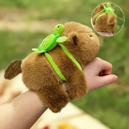Capybara plüss interaktiv mozgó farokkal csuklóra tehető ,levehető teknős páncéllal a hátán. - Image 3
